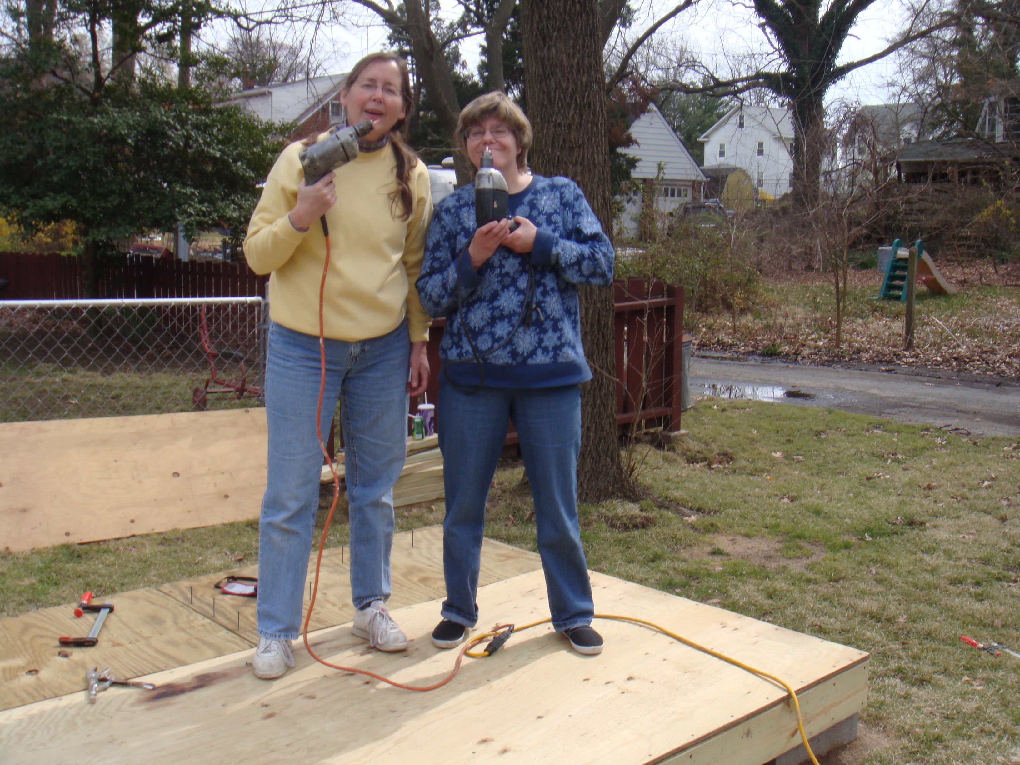 Linda and Tina holding drills